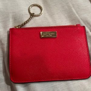 Red Kate Spade zip wallet with keychain